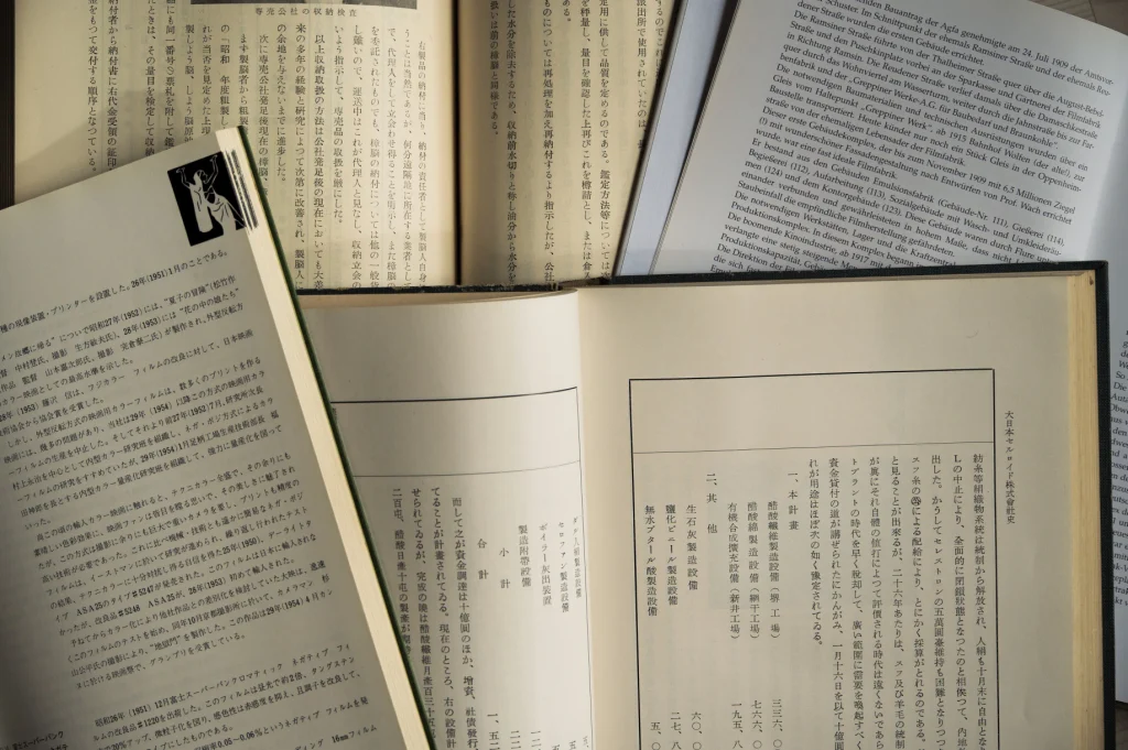 illustrative photograph of books in multiple languages overlaid on top of each other
